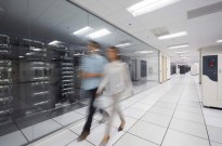 Workers Walking in a Large Data Center